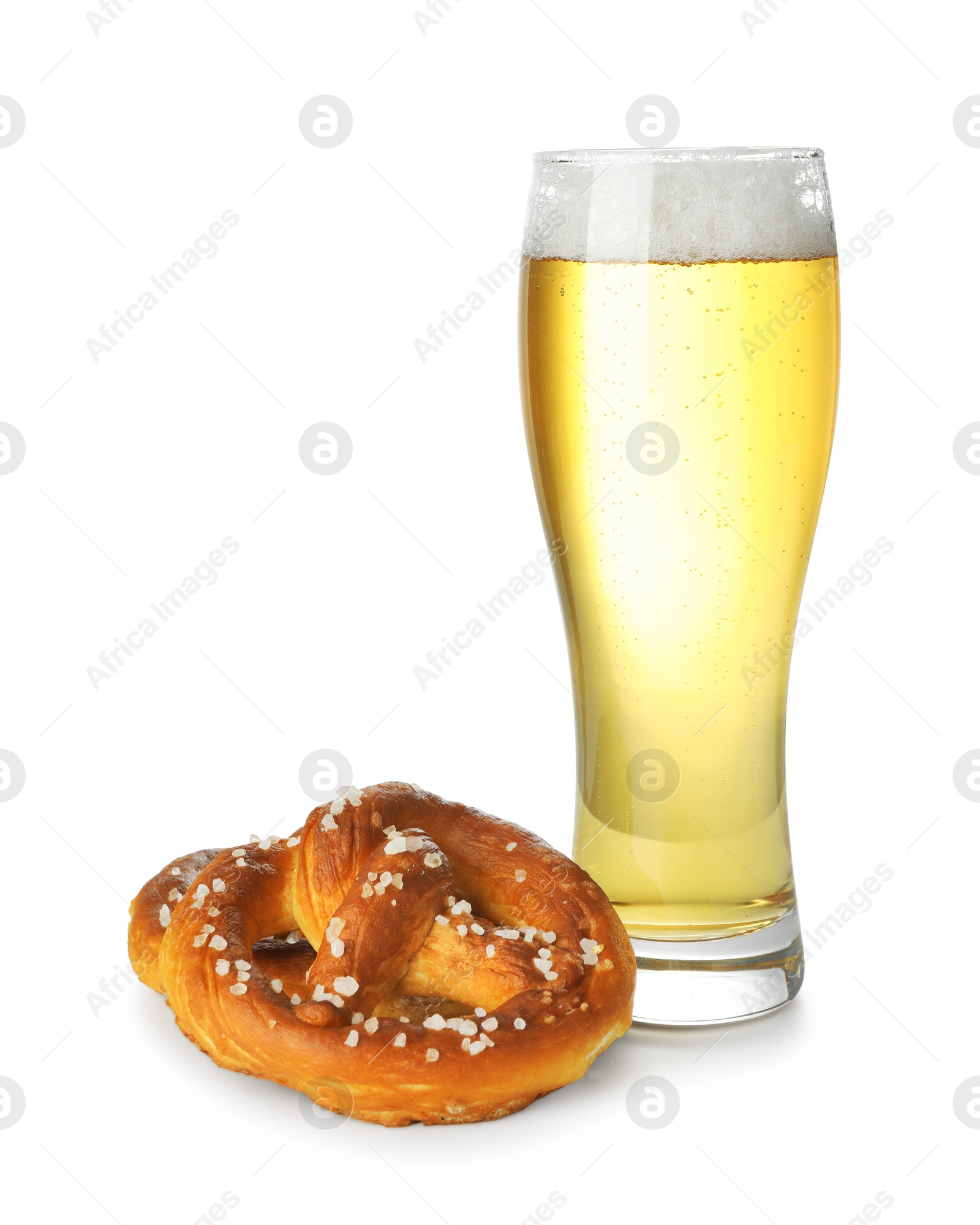 Tasty pretzel and glass of beer isolated on white Photo of Tasty pretzel and glass of beer isolated on white