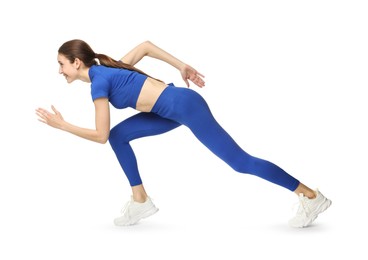 Photo of Woman in sportswear running on white background