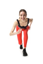 Photo of Woman in sportswear running on white background