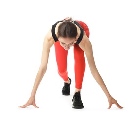 Photo of Runner in starting position on white background
