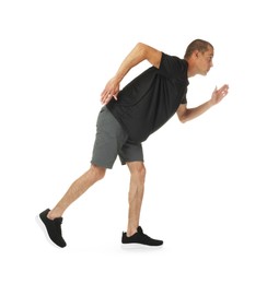 Photo of Man in sportswear running on white background