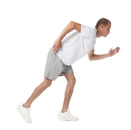 Photo of Man in sportswear running on white background