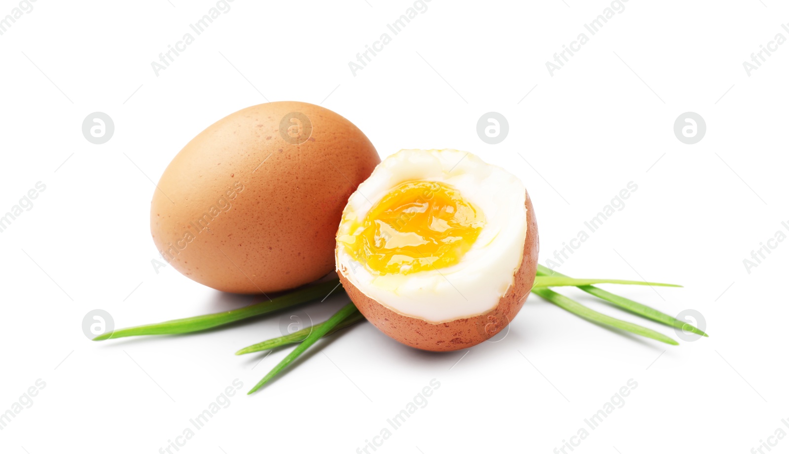 Photo of Soft boiled eggs with green onions isolated on white