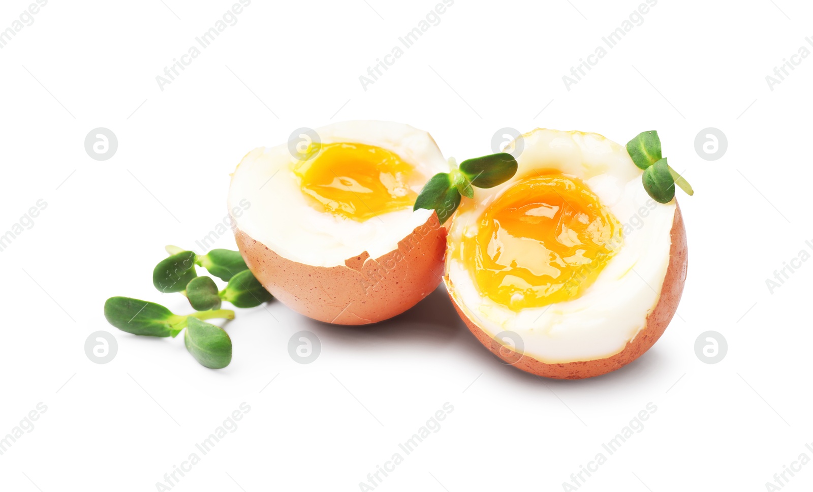 Soft boiled eggs with microgreens on white background Photo of Soft boiled eggs with microgreens on white background