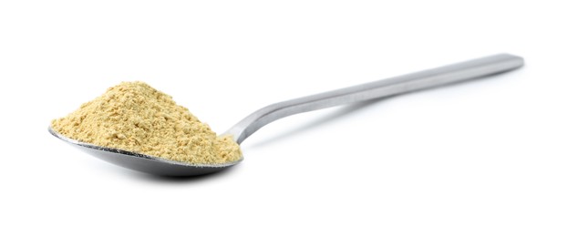 Photo of Superfood. Wasabi powder in spoon isolated on white