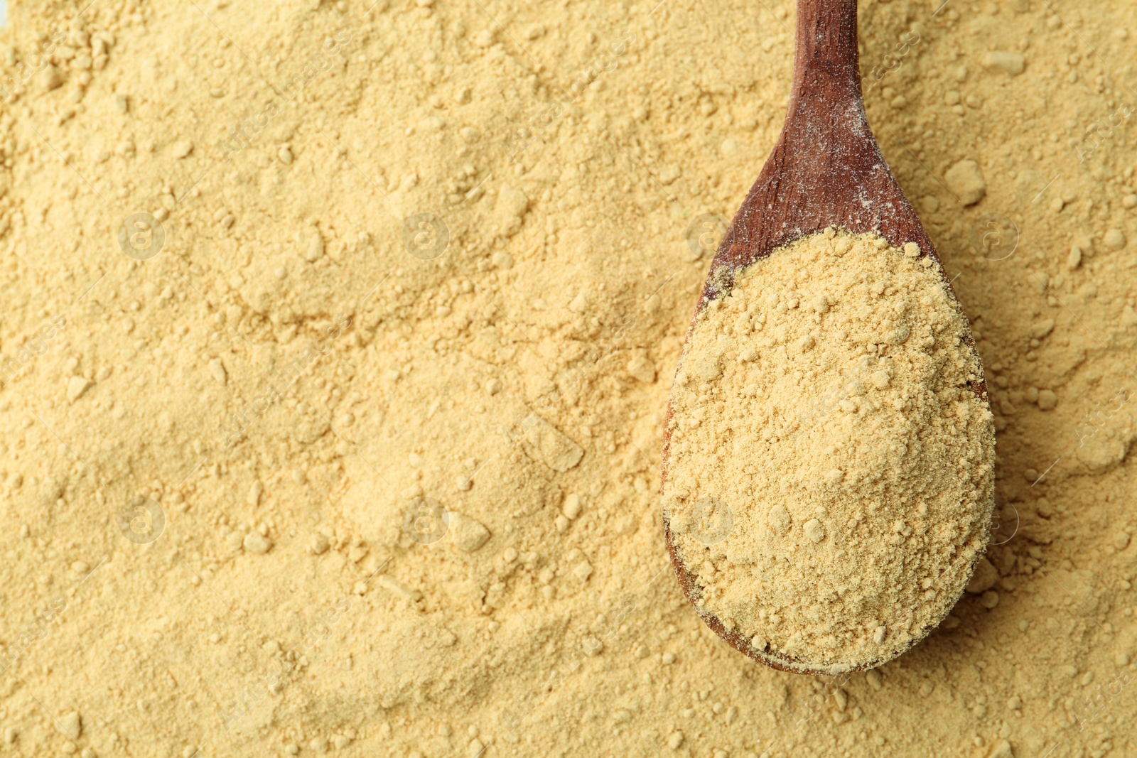 Superfood supplement. Wasabi powder and spoon, top view Photo of Superfood supplement. Wasabi powder and spoon, top view