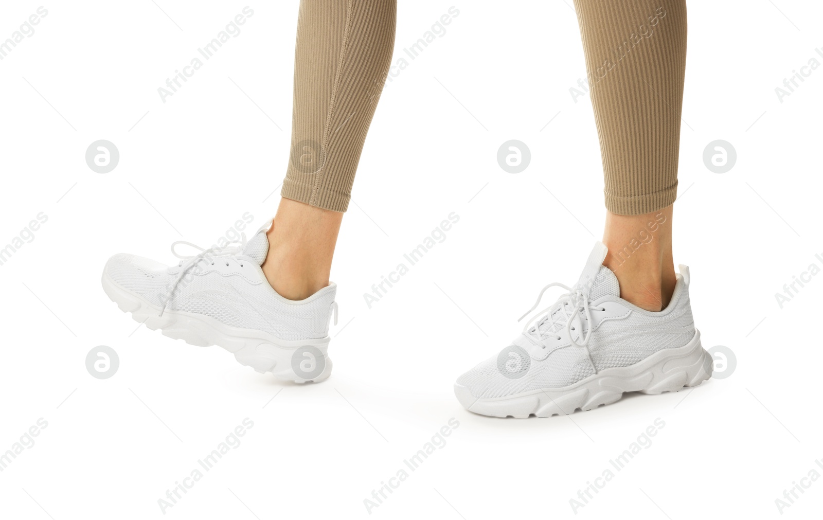 Runner in starting position on white background, closeup Photo of Runner in starting position on white background, closeup