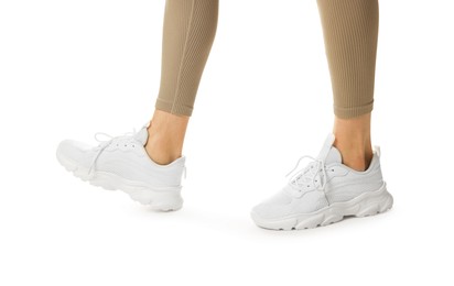 Photo of Runner in starting position on white background, closeup