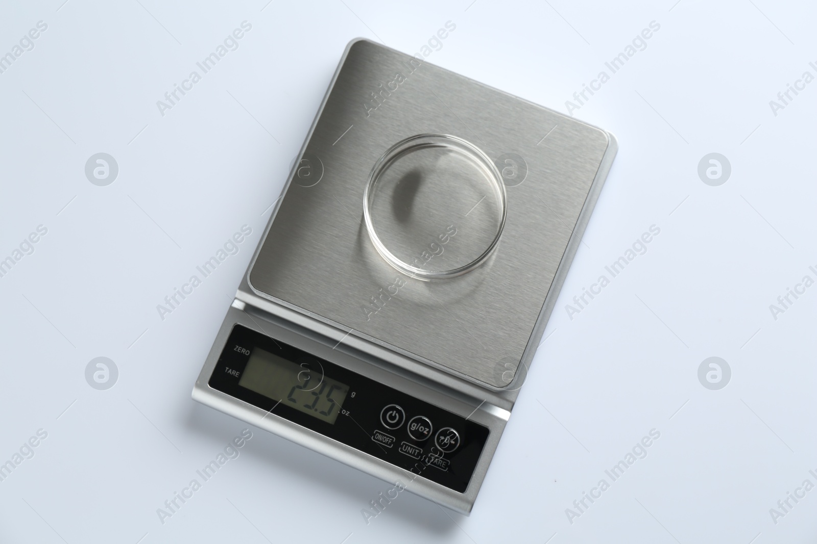 Laboratory scale with Petri dish on white background, top view Photo of Laboratory scale with Petri dish on white background, top view
