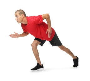 Photo of Man in sportswear running on white background