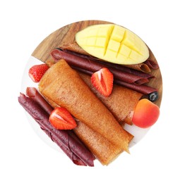 Photo of Delicious fruit leather rolls, berries and mango isolated on white, top view