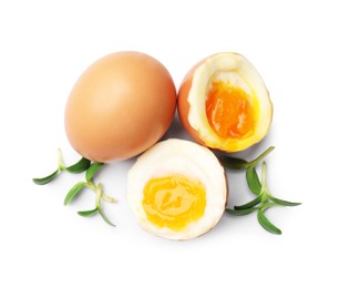 Photo of Soft boiled eggs with microgreens on white background, top view