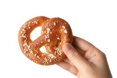 Photo of Woman with tasty pretzel on white background, closeup