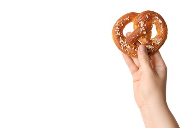 Photo of Woman with tasty pretzel on white background, closeup
