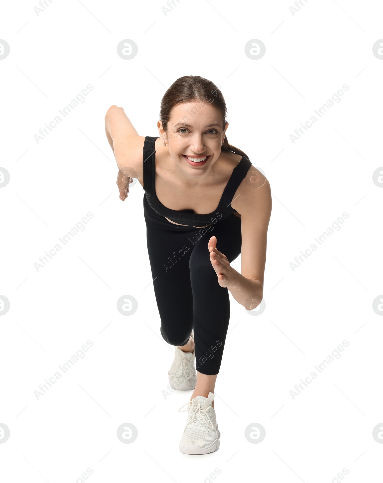 Woman in sportswear running on white background Photo of Woman in sportswear running on white background