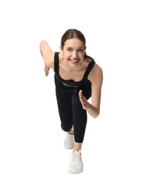 Photo of Woman in sportswear running on white background