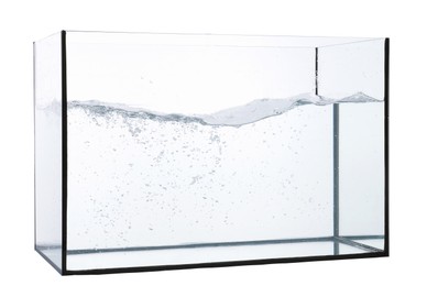 Photo of Glass aquarium with splashing water isolated on white