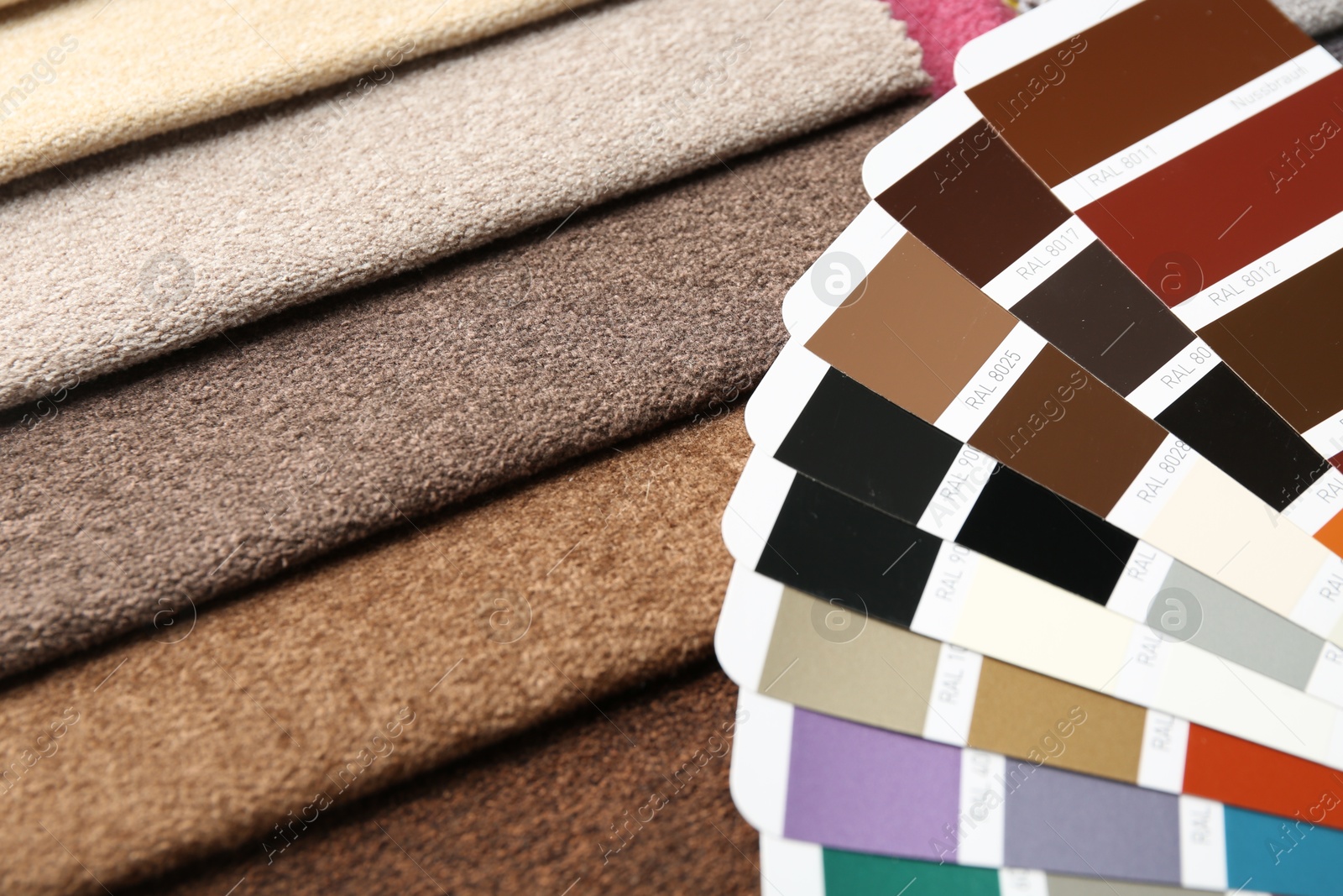 Samples of colorful fabrics and color palettes, closeup Photo of Samples of colorful fabrics and color palettes, closeup