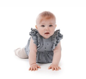 Photo of Cute little baby crawling on white background