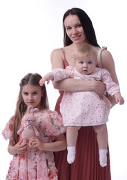 Photo of Mother and her cute kids on white background