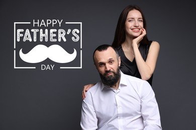 Image of Happy Father's Day. Happy daughter and her dad on dark grey background