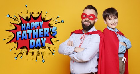 Image of Happy Father's Day. Daddy and his son wearing superhero costumes on orange background