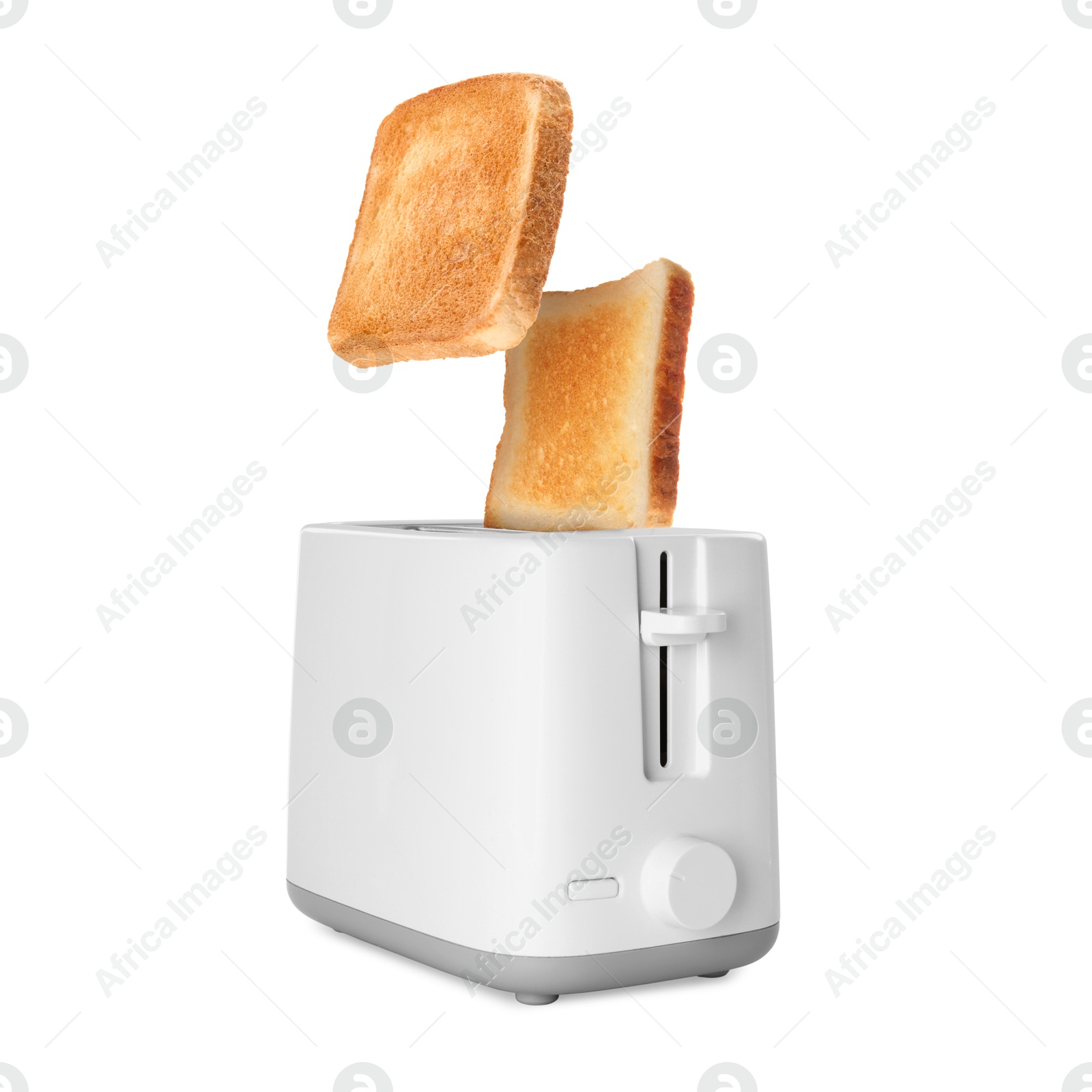 Slices of toasted bread jumping out of toaster on white background Image of Slices of toasted bread jumping out of toaster on white background