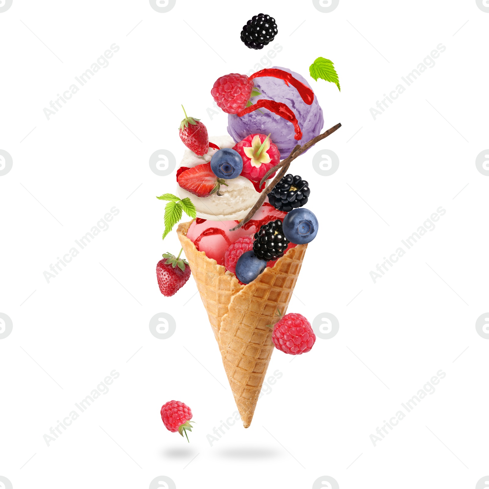 Yummy ice cream balls, wafer cone and berries in air on white background Image of Yummy ice cream balls, wafer cone and berries in air on white background