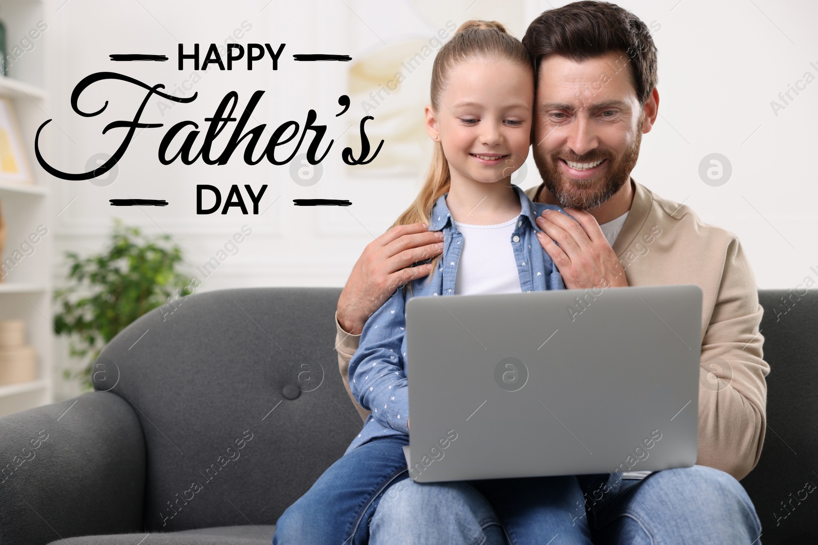 Image of Happy Father's Day. Happy daddy and his daughter with laptop on sofa at home