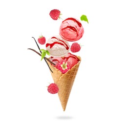 Image of Yummy ice cream cone and raspberries in air on white background