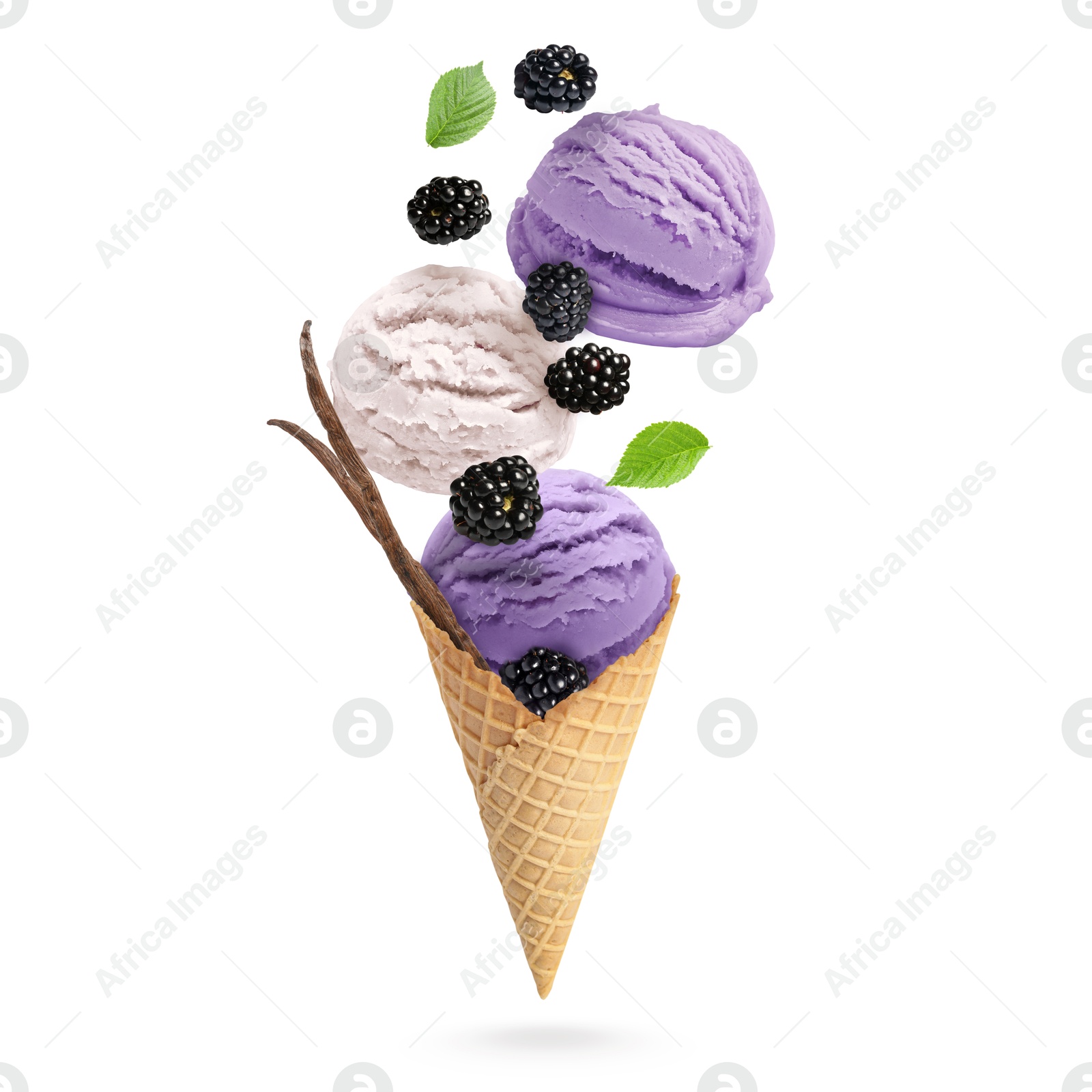 Yummy ice cream balls, wafer cone and blackberries in air on white background Image of Yummy ice cream balls, wafer cone and blackberries in air on white background