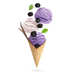 Image of Yummy ice cream balls, wafer cone and blackberries in air on white background