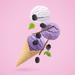 Image of Yummy ice cream balls, wafer cone and blackberries in air on light violet background