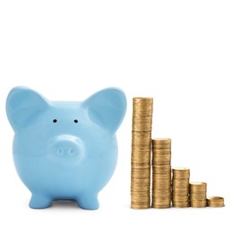 Image of Light blue piggy bank and stacks of coins from bigger to smaller on white background