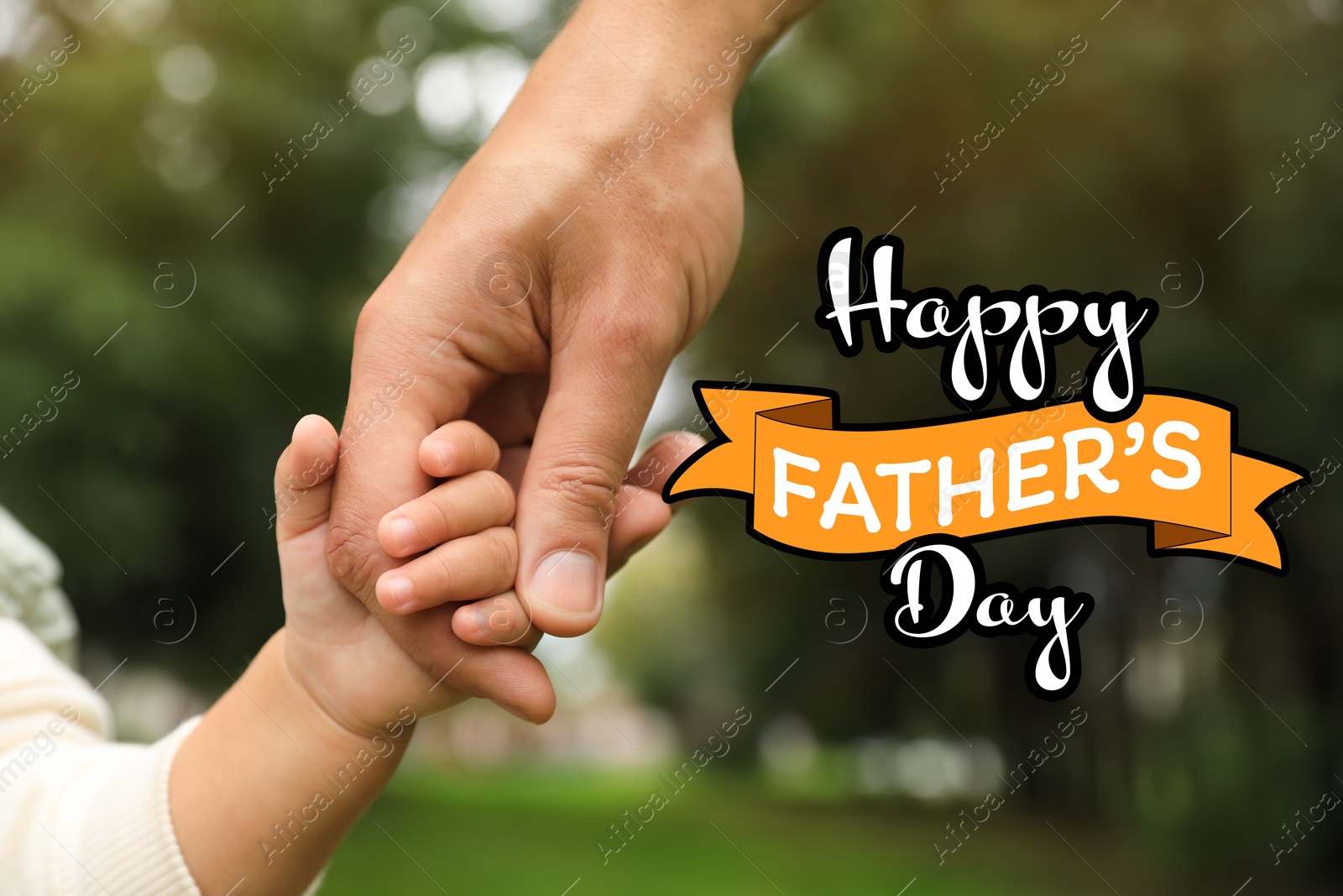 Happy Father's Day. Daughter holding daddy's hand in park, closeup Image of Happy Father's Day. Daughter holding daddy's hand in park, closeup