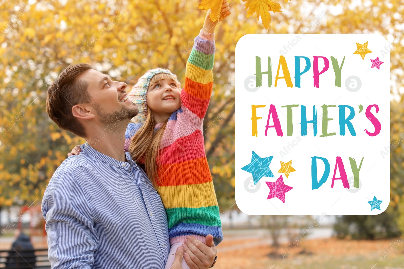 Happy Father's Day. Daddy with his daughter spending time together in autumn park Image of Happy Father's Day. Daddy with his daughter spending time together in autumn park