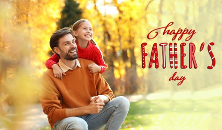 Image of Happy Father's Day. Happy daddy and daughter spending time in park