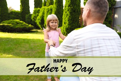 Image of Happy Father's Day. Daddy and his daughter spending time together on green lawn in park