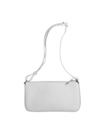 Image of Stylish white handbag in air on white background