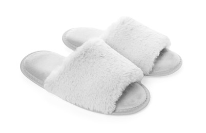 Image of Pair of soft white slippers with fur on white background