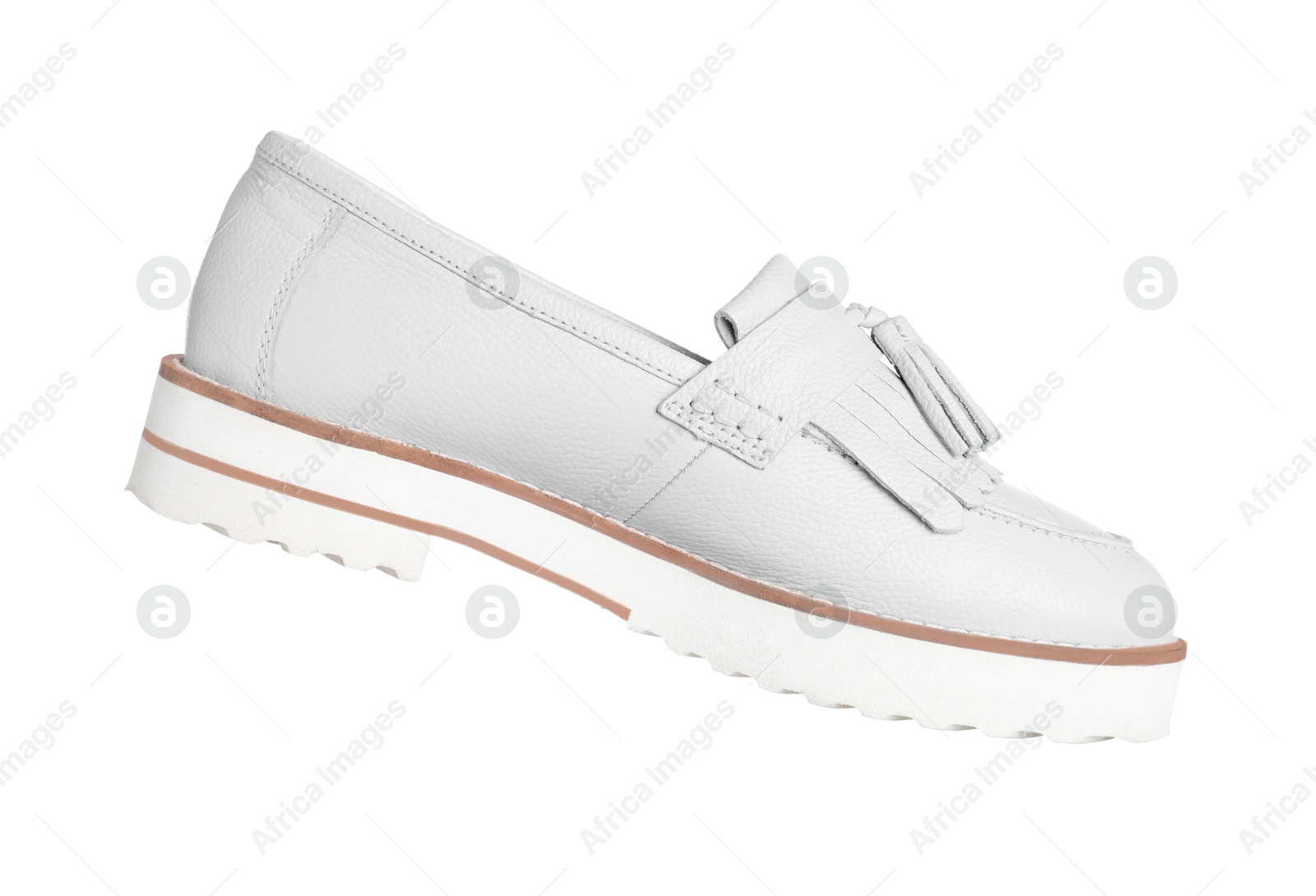 One white shoe in air on white background Image of One white shoe in air on white background
