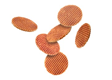 Image of Yummy Dutch waffles (stroopwafels) flying on white background