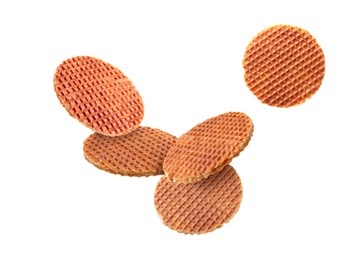 Image of Yummy Dutch waffles (stroopwafels) flying on white background