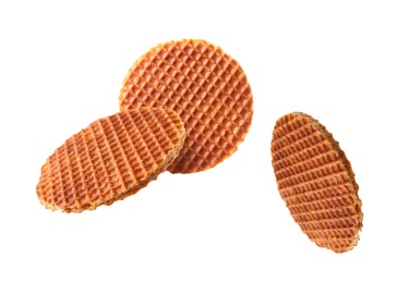 Image of Yummy Dutch waffles (stroopwafels) flying on white background
