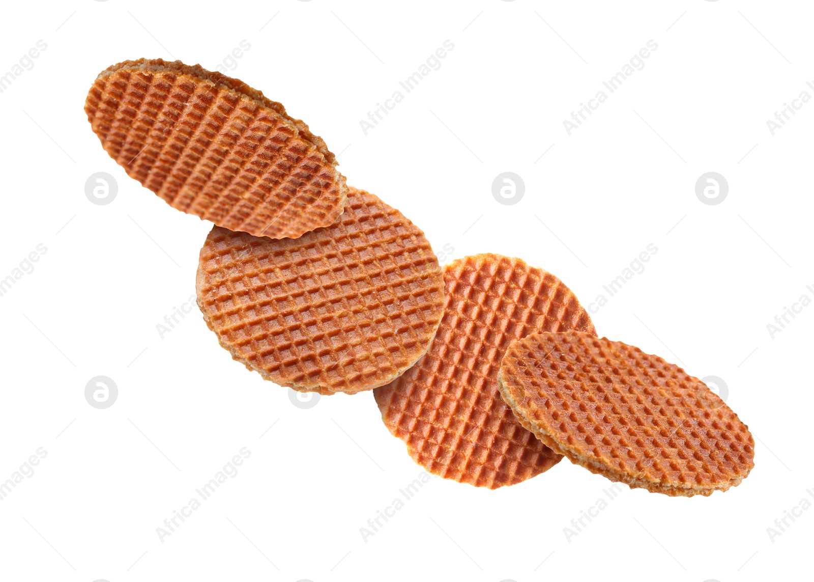 Yummy Dutch waffles (stroopwafels) flying on white background Image of Yummy Dutch waffles (stroopwafels) flying on white background