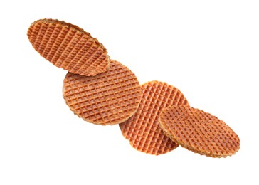 Image of Yummy Dutch waffles (stroopwafels) flying on white background