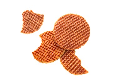Image of Yummy Dutch waffles (stroopwafels) flying on white background