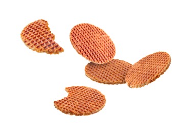 Image of Yummy Dutch waffles (stroopwafels) flying on white background