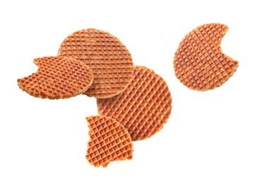 Image of Yummy Dutch waffles (stroopwafels) flying on white background
