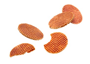 Image of Yummy Dutch waffles (stroopwafels) flying on white background